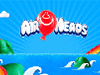 Colorful logo for Airheads candy, featuring a smiling red balloon against a bright blue sky with stylized clouds and hills, symbolizing fun and playfulness.
